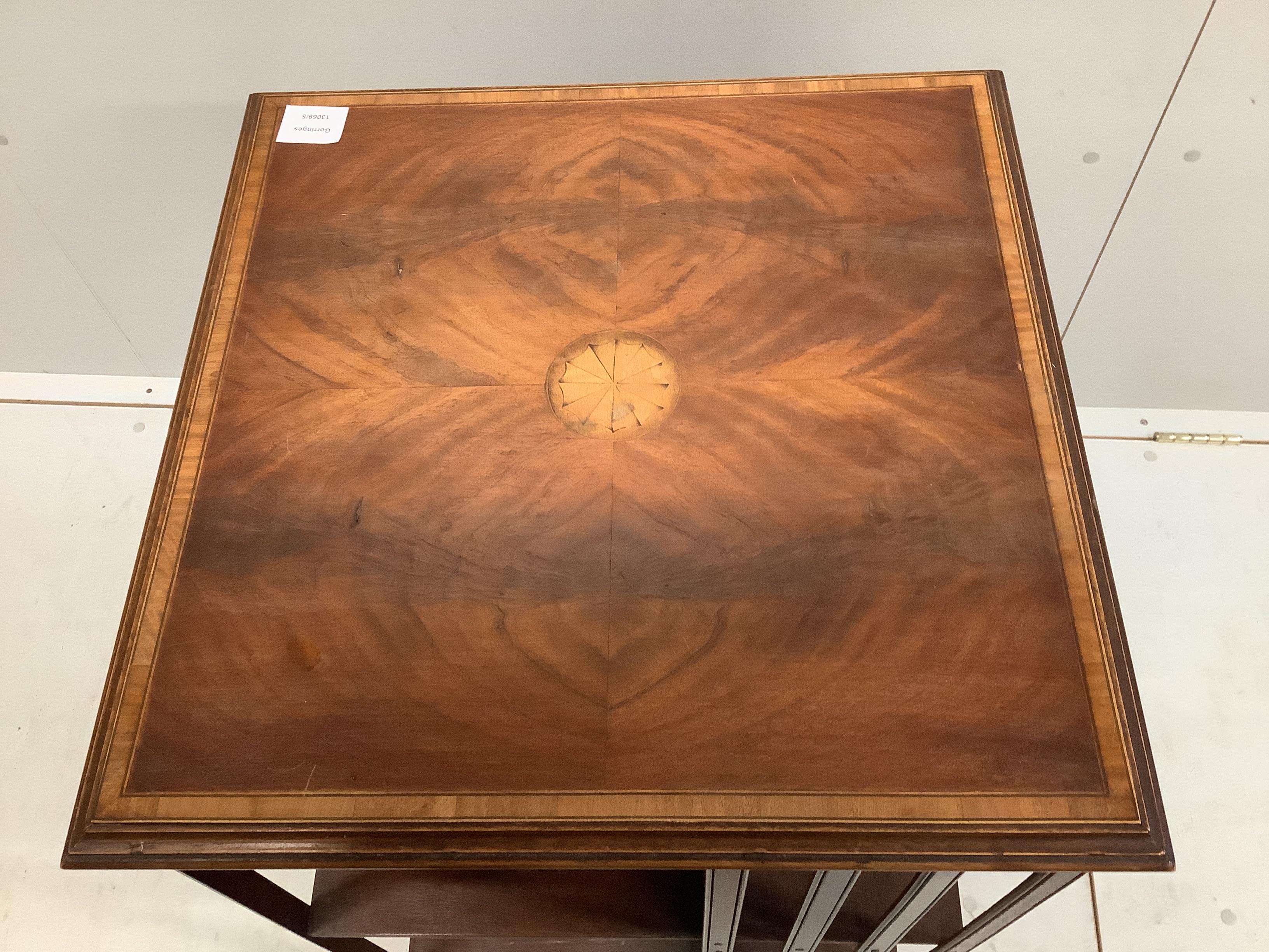 An Edwardian style inlaid mahogany revolving bookcase, width 49cm, depth 49cm, height 81cm